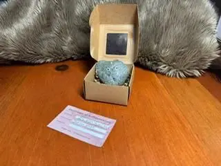 rock in brown box